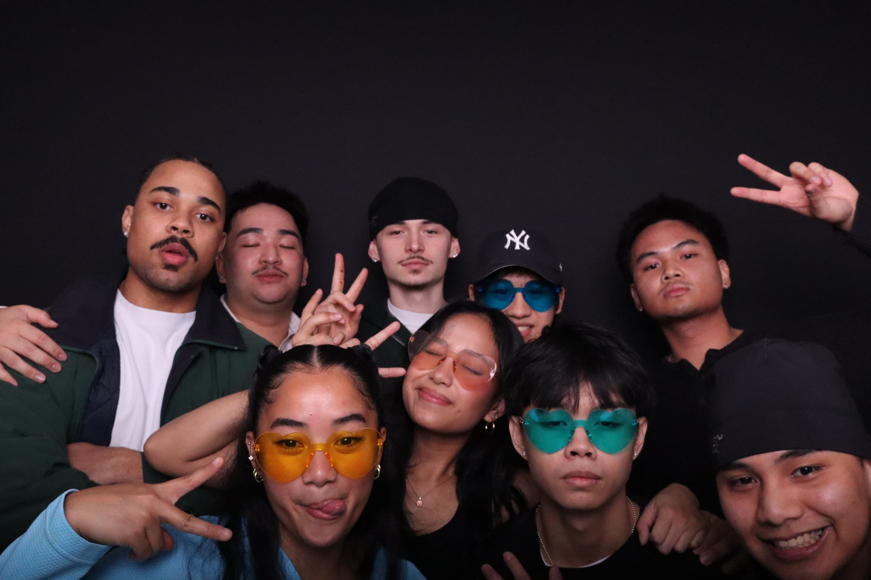 Large group with colourful sunglasses at birthday photo booth Vancouver